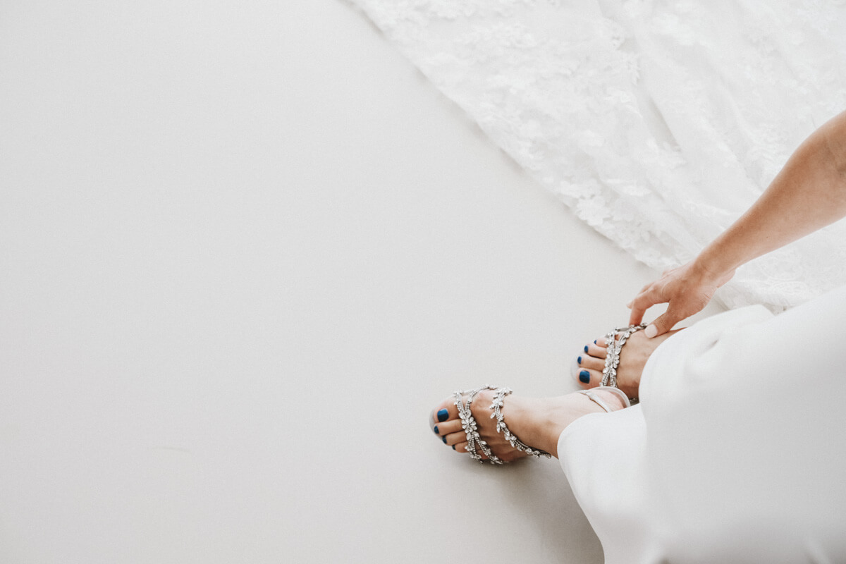 Bridal shoes during preparations at Mykonos wedding