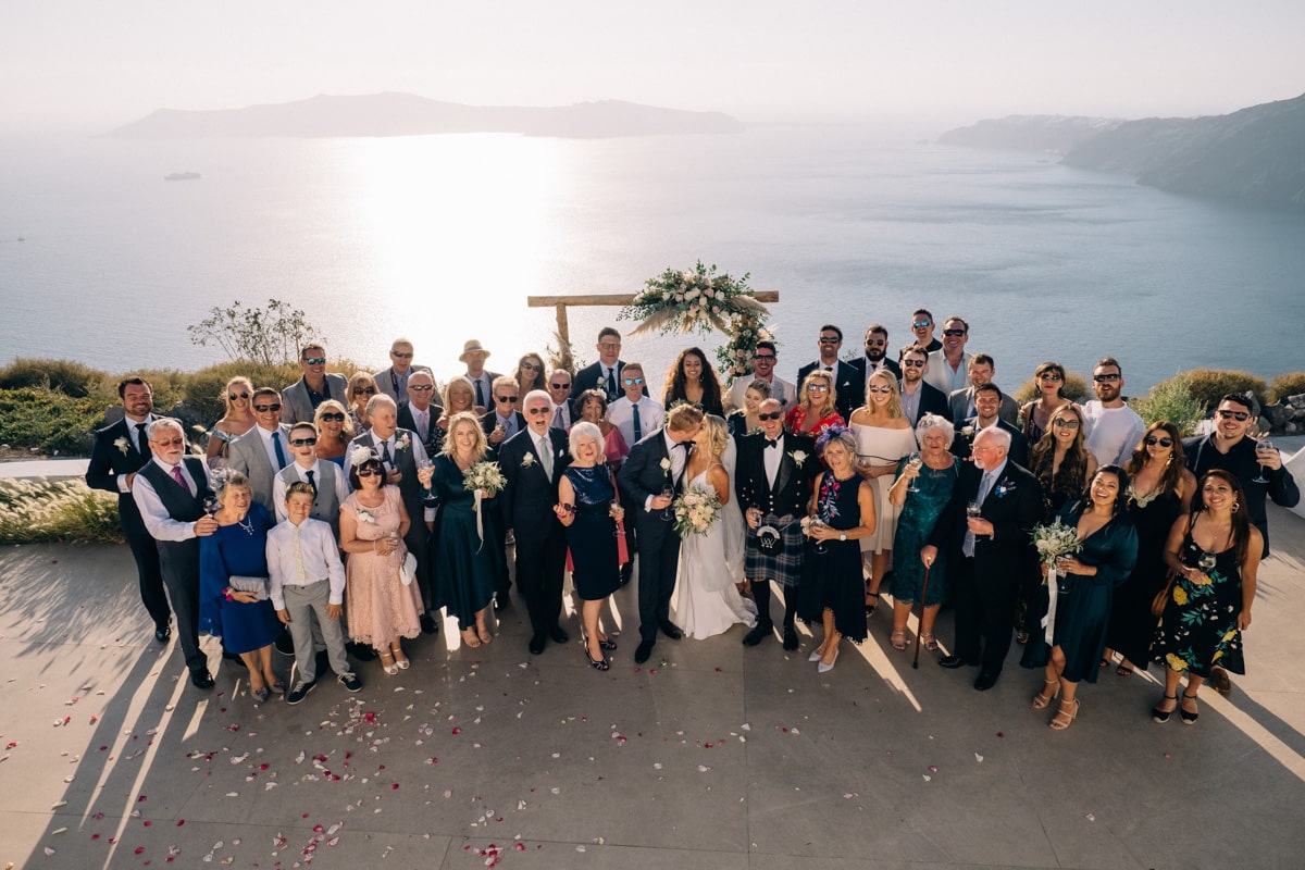 Santorini wedding group portraits of couple and guests