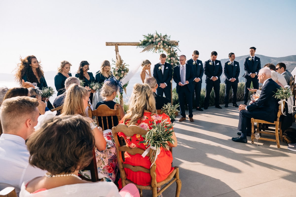 Santorini destination wedding ceremony at Cavo Tagoo